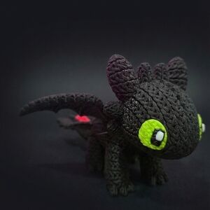 Disney Black and Green Knitted Dragon Toy